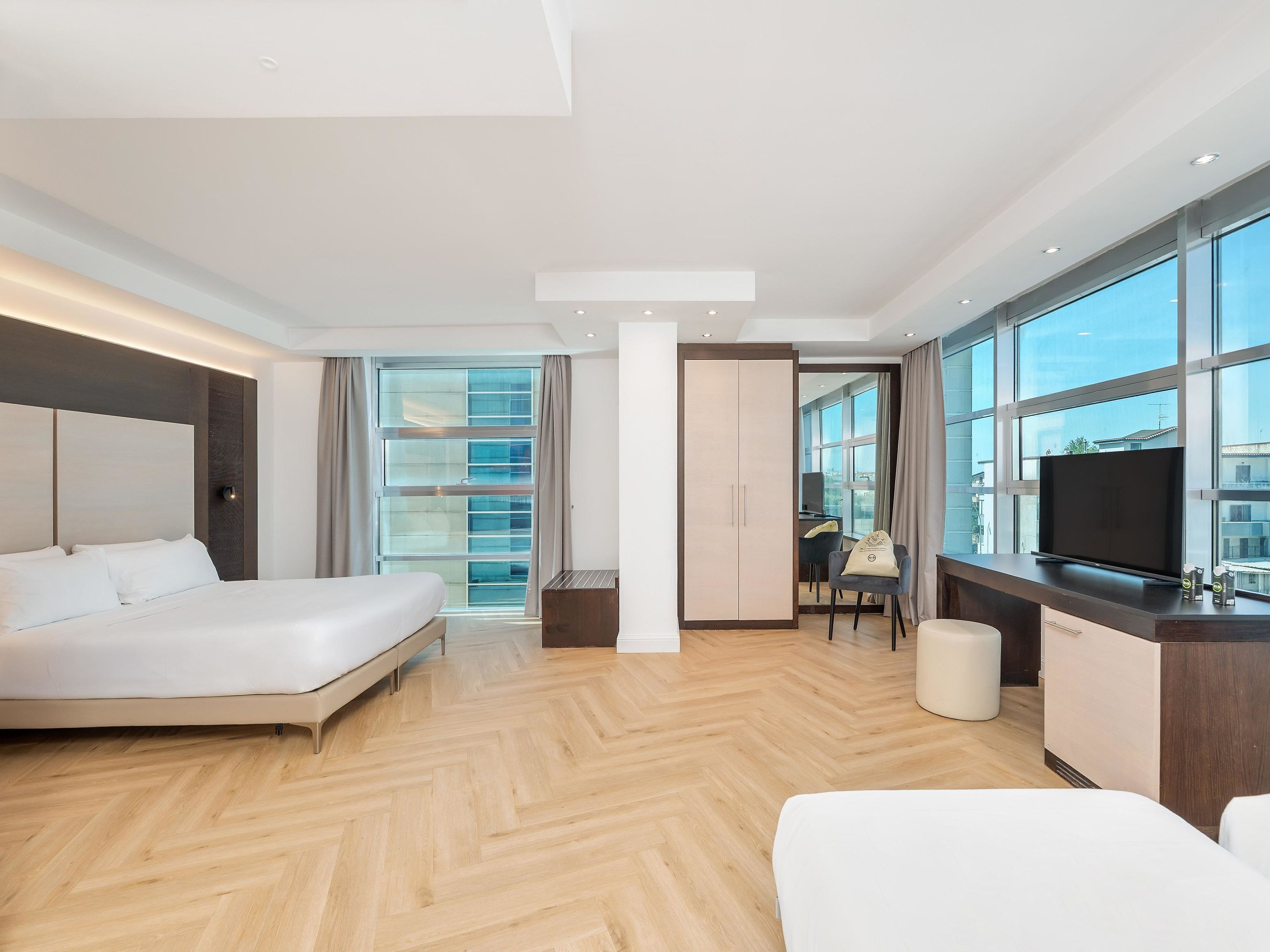 Quadrupla Standard | Minibar, una cassaforte in camera, una scrivania, insonorizzazione