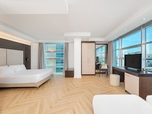 Standard Quadruple Room | Minibar, in-room safe, desk, soundproofing