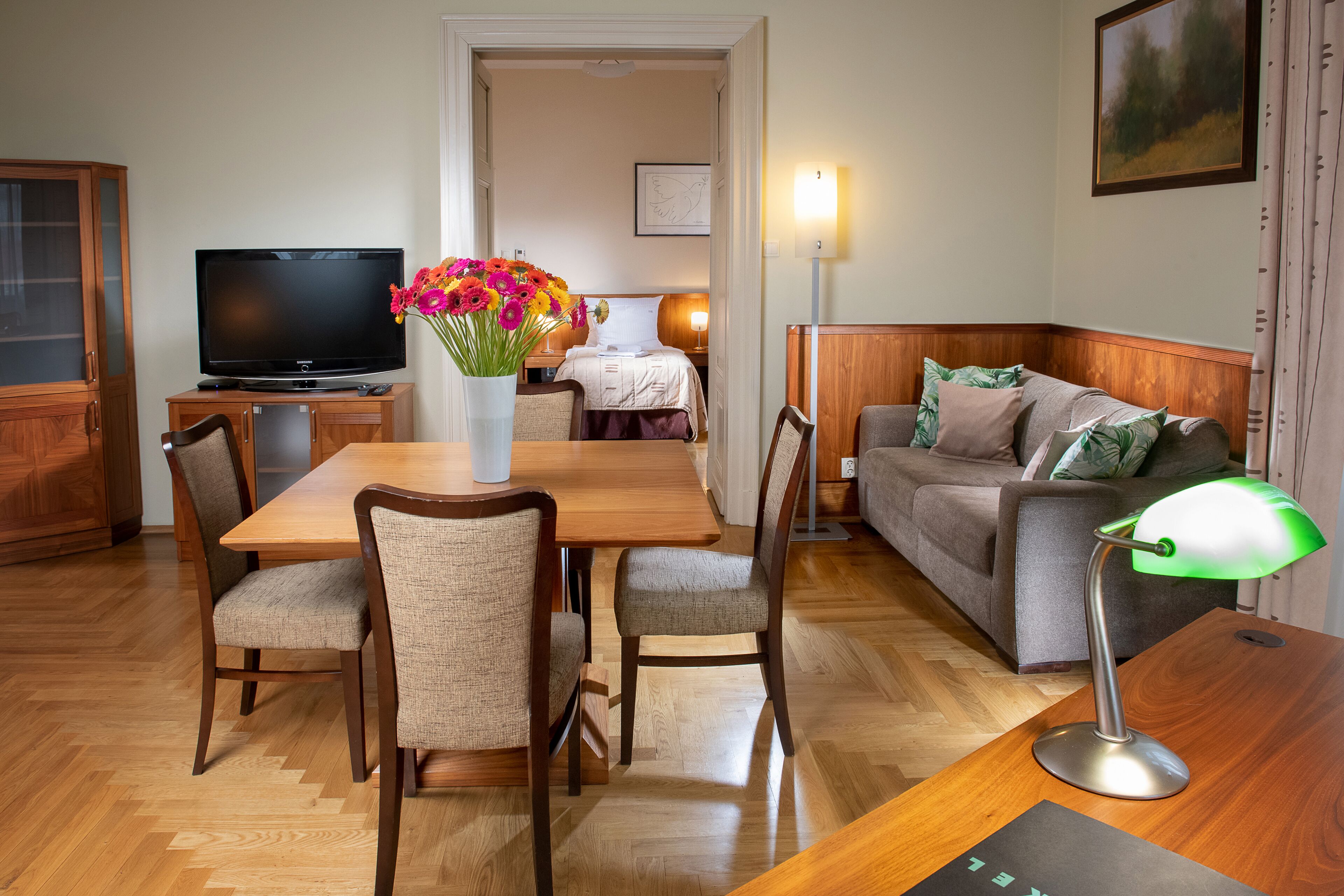 deluxe apartment | in-room safe, desk, blackout curtains, iron/ironing board