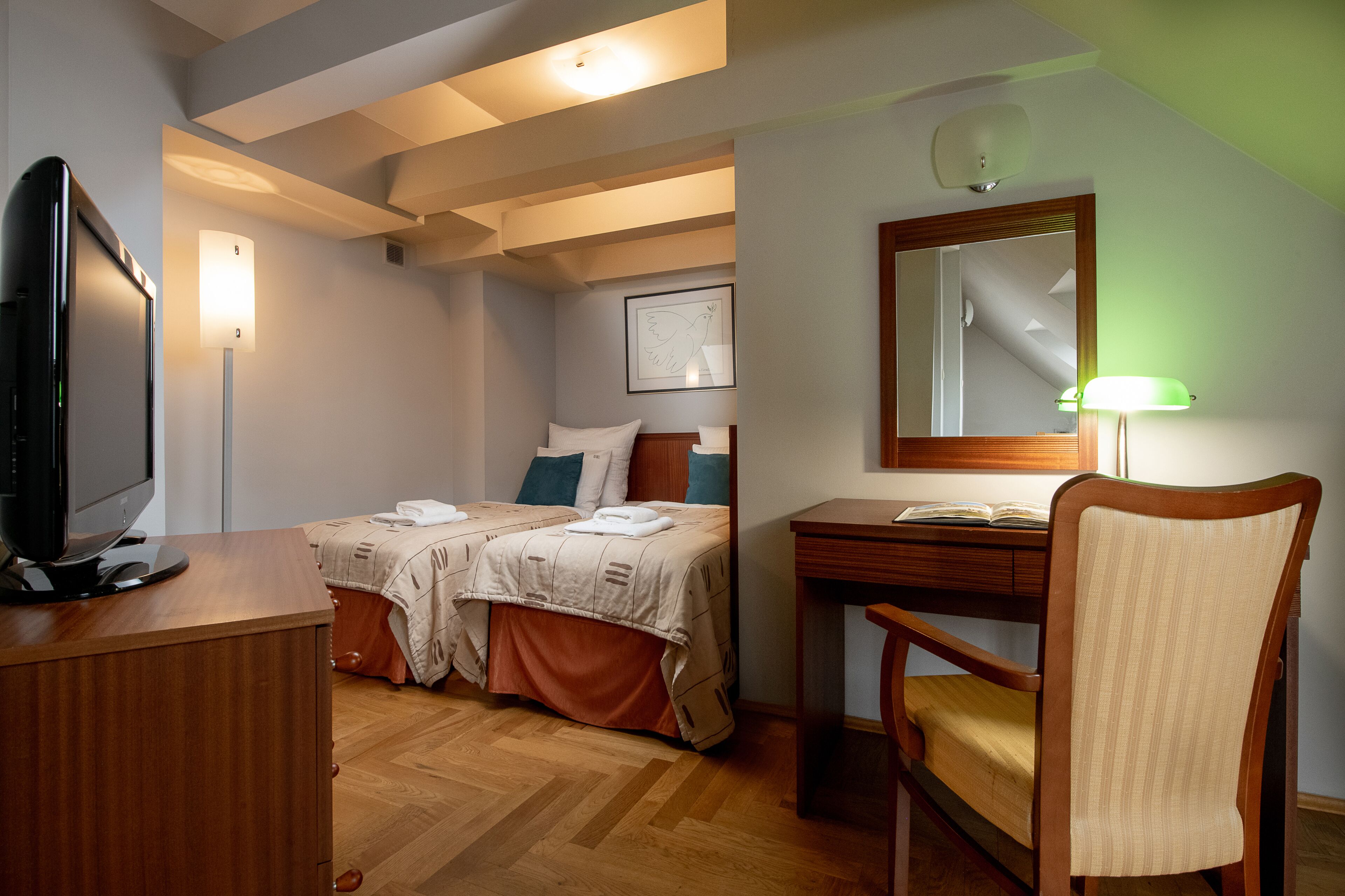 economy apartment | in-room safe, desk, blackout curtains, iron/ironing board