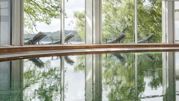 Indoor pool, open 7:00 AM to 10:00 PM, sun loungers