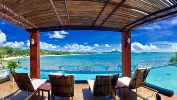 Outdoor pool, pool umbrellas, sun loungers