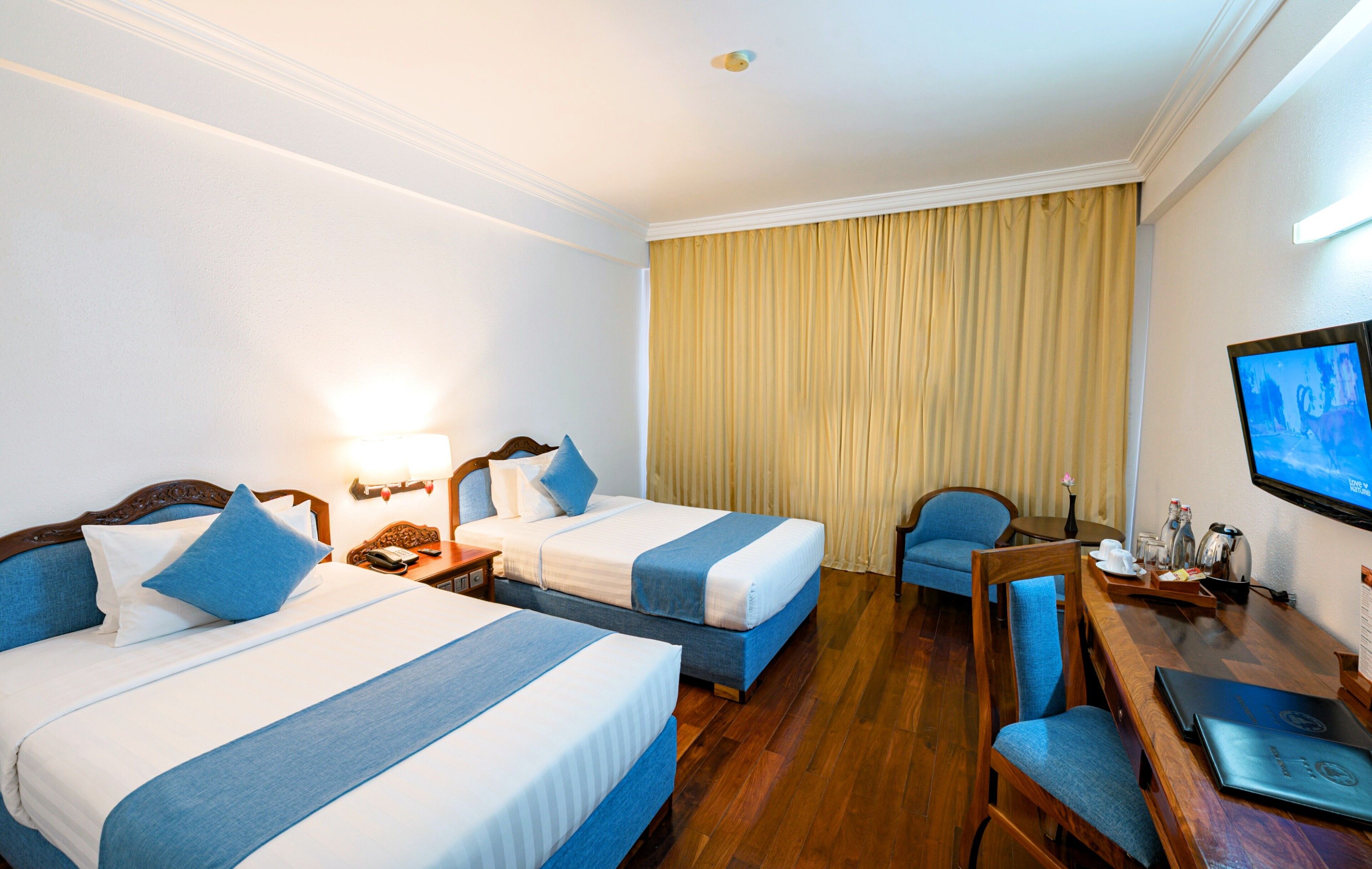 Deluxe Twin Room, Balcony with Pool View | Minibar, in-room safe, individually decorated, individually furnished