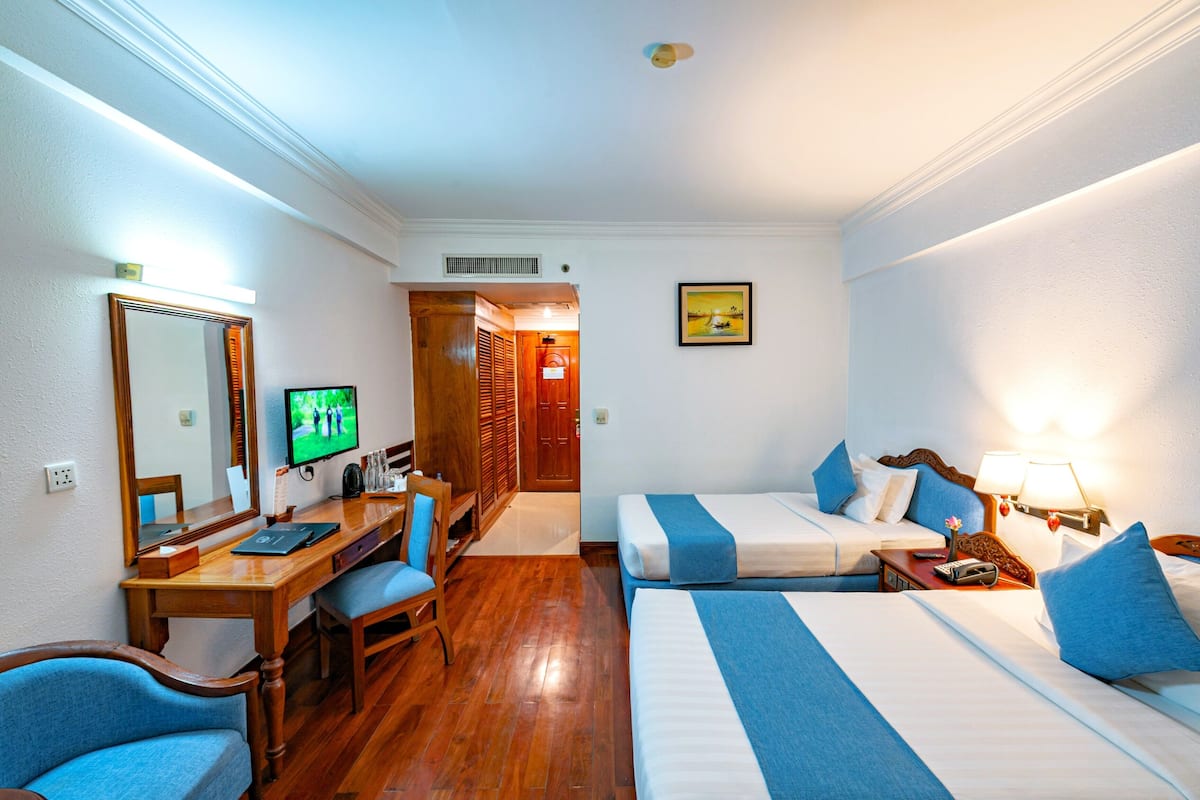 Deluxe Twin Room, Balcony with Pool View | Minibar, in-room safe, individually decorated, individually furnished