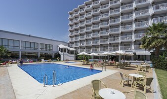 Outdoor pool, open 10:30 AM to 6:30 PM, pool umbrellas, sun loungers