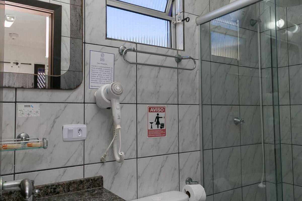 deluxe triple room | bathroom | shower, free toiletries, hair dryer, towels