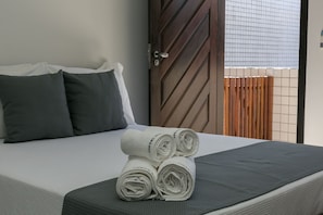 Deluxe Triple Room | Minibar, in-room safe, free WiFi, bed sheets - Hotel Pousada Porto da Lua (Guaratuba)