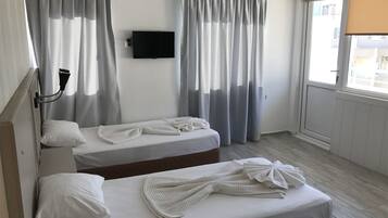 Family Room, Balcony | Premium bedding, minibar, in-room safe, soundproofing