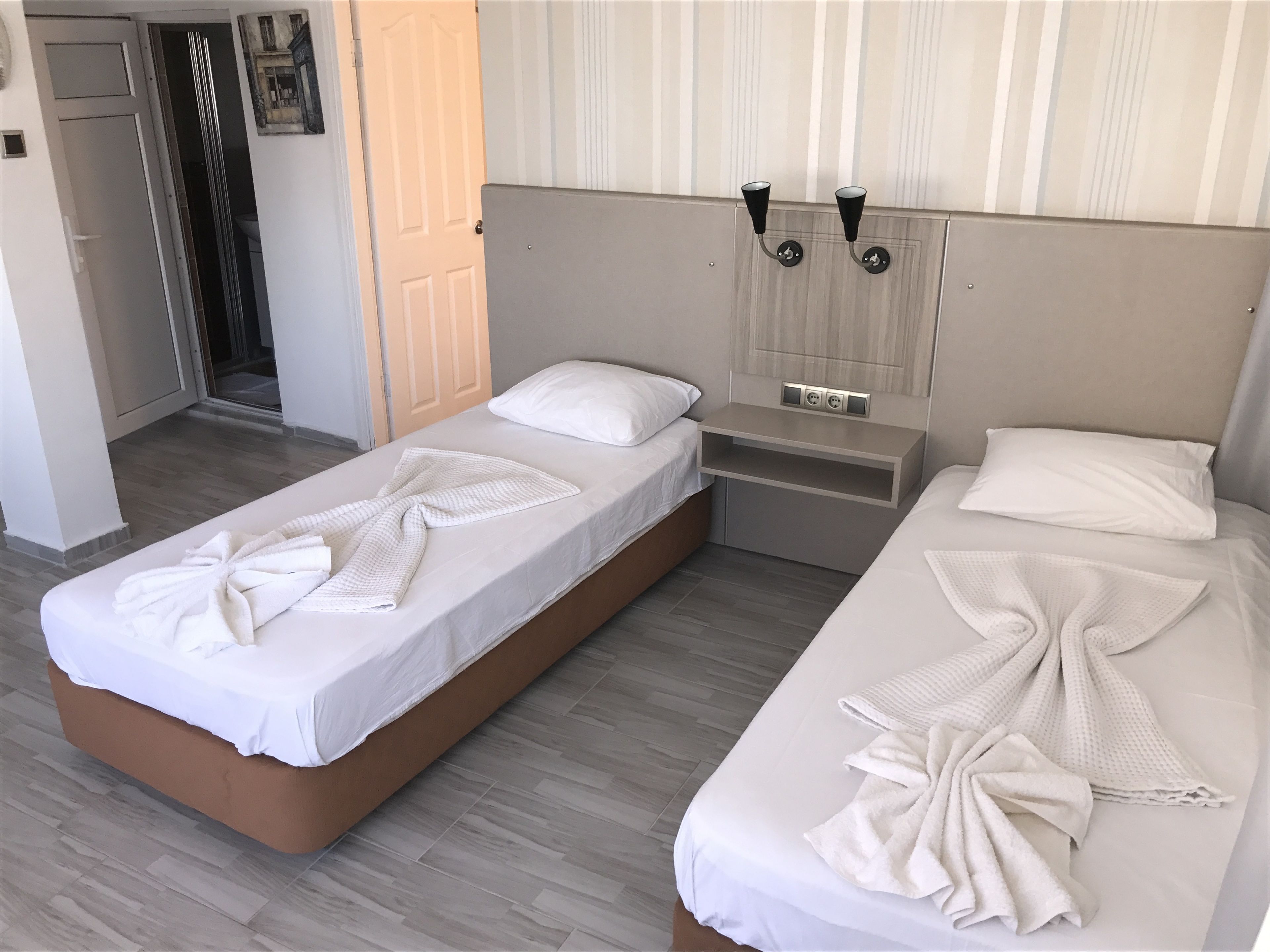 family room, balcony | premium bedding, minibar, in-room safe, soundproofing