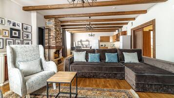 Superior Chalet, 8 Bedrooms (#11) | Living area | TV, fireplace