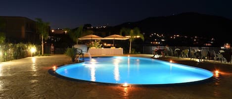 Seasonal outdoor pool, pool umbrellas, pool loungers