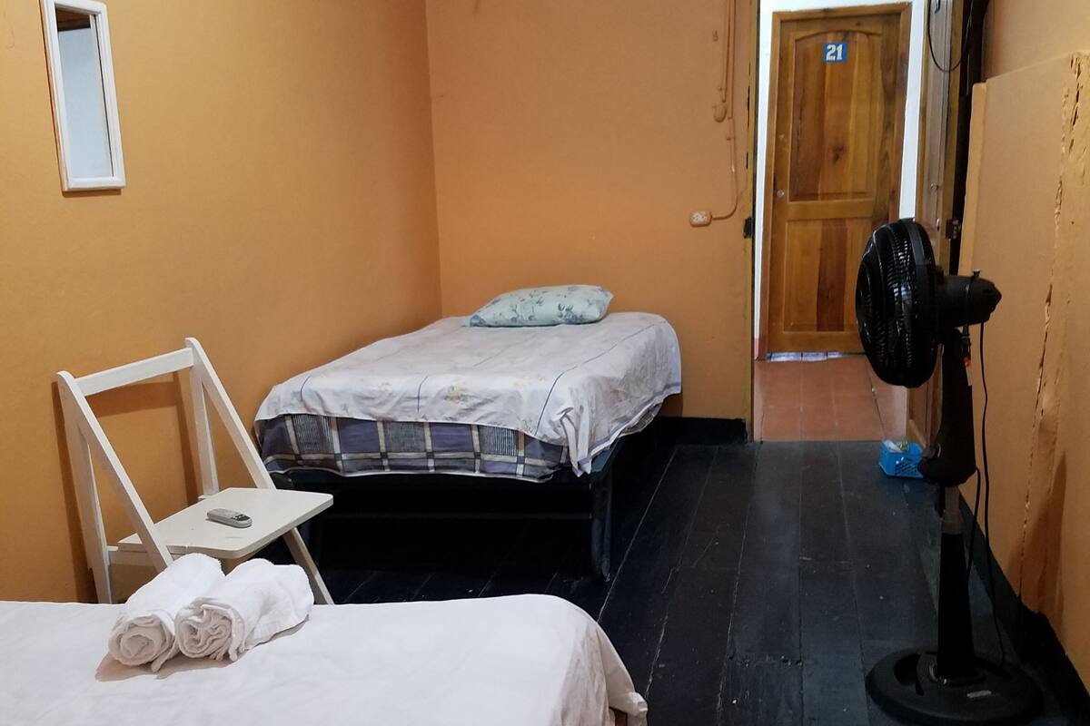 Basic Triple Room, Multiple Beds, Private Bathroom | Desk, free WiFi