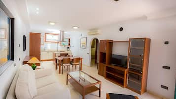Apartment, 2 Bedrooms | Living area | Flat-screen TV