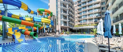 Seasonal outdoor pool, open 10:00 AM to 6:00 PM, pool umbrellas