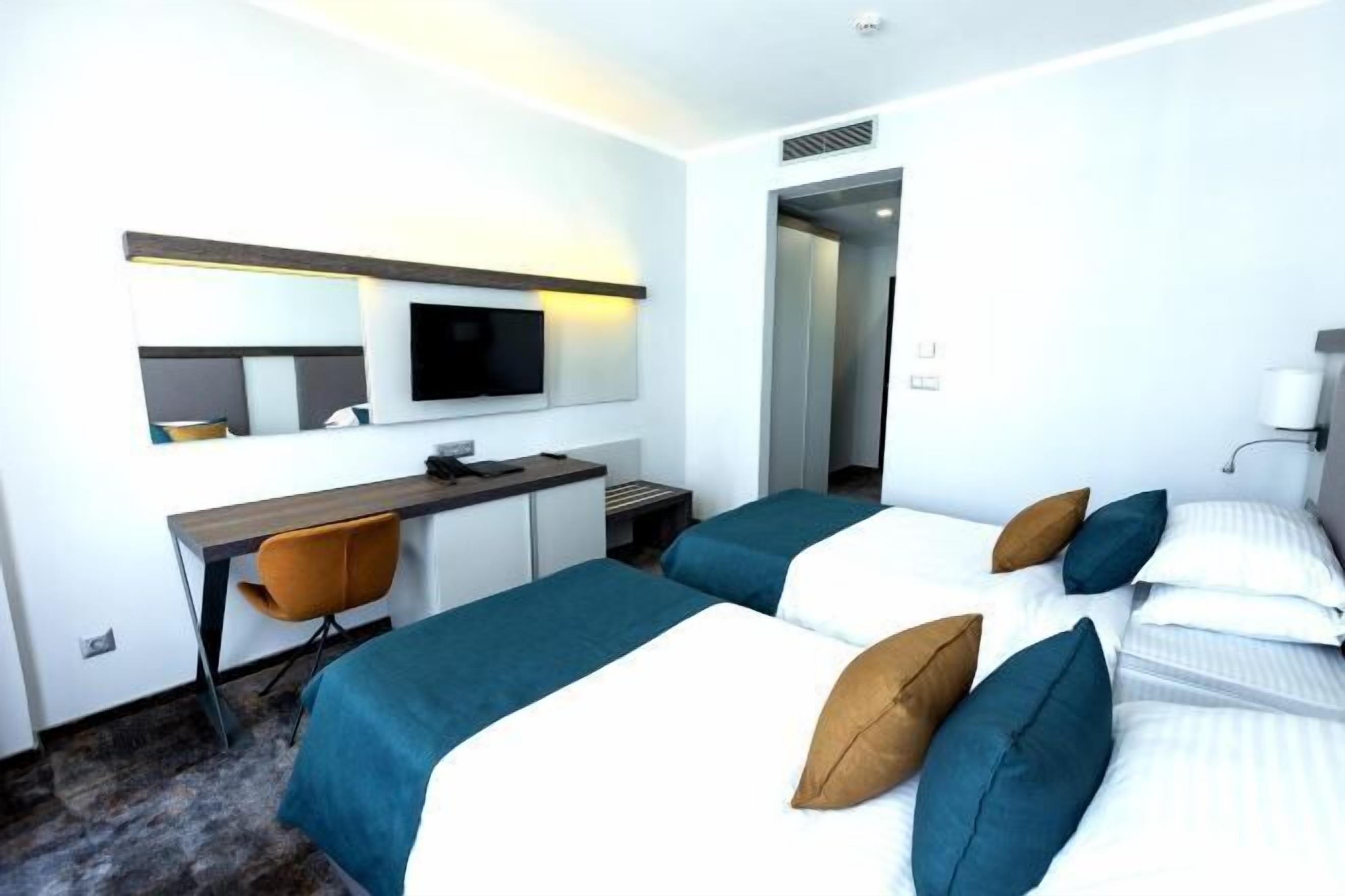 Frette Italian sheets, premium bedding, Select Comfort beds, minibar