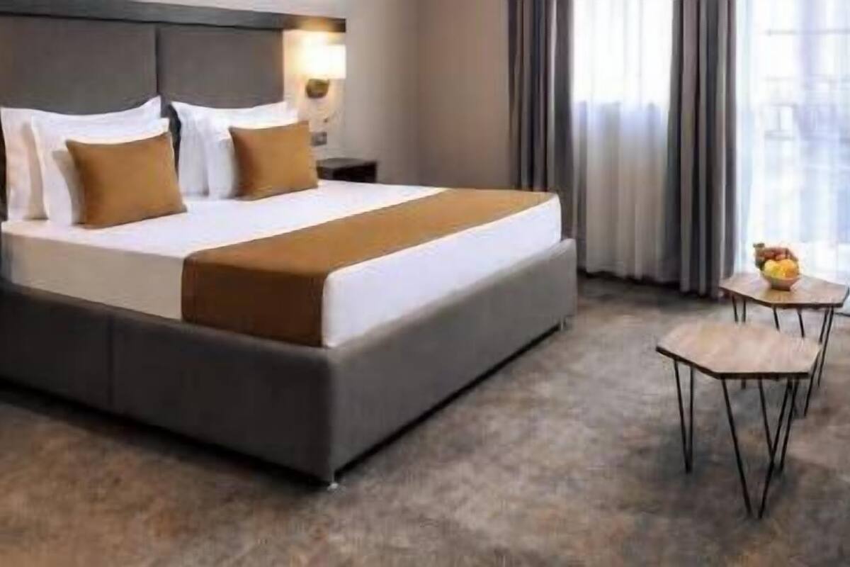 Frette Italian sheets, premium bedding, Select Comfort beds, minibar
