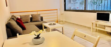Apartment, 1 Bedroom, Ground Floor | Living area | 25-inch flat-screen TV with digital channels, TV