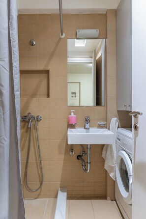 Shower, rainfall showerhead, hair dryer, slippers