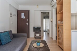Apartment, 1 Bedroom (4th Floor) | Living area | 25-inch flat-screen TV with digital channels, TV - Elvita Apartments (Athens)