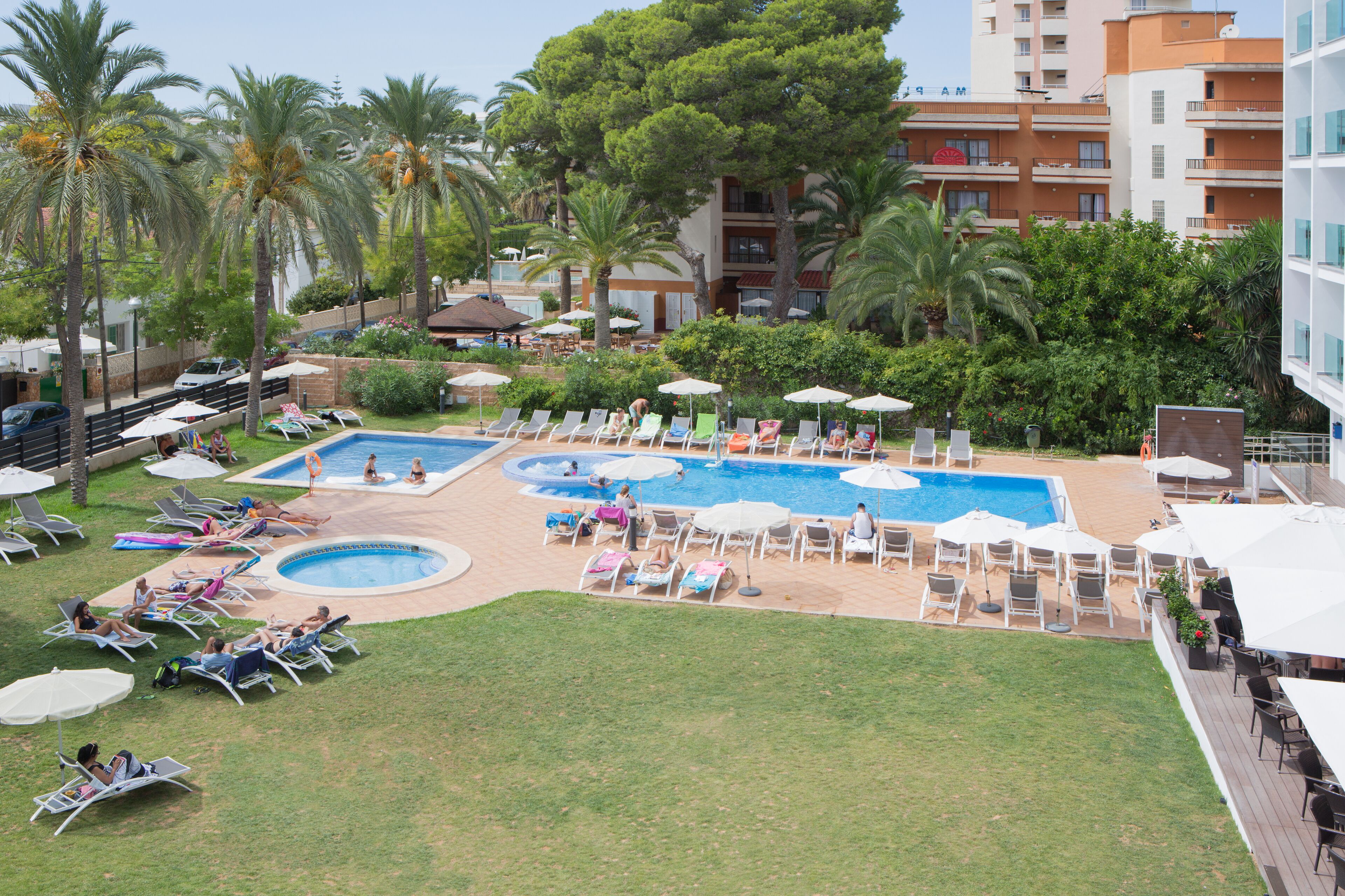 seasonal outdoor pool, open 9:00 am to 8:00 pm, pool umbrellas