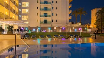 Seasonal outdoor pool, open 9:00 AM to 8:00 PM, pool umbrellas