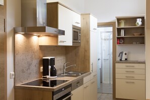 Apartment (B) | Private kitchen | Fridge - Hotel Ennskraxblick (Kleinarl)