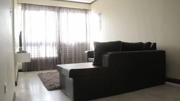 City Apartment, 2 Bedrooms, Refrigerator & Microwave, City View | 1 bedroom, Egyptian cotton sheets, in-room safe, individually decorated