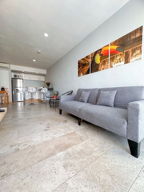 Junior Studio Suite | Living area | 32-inch flat-screen TV with digital channels, TV - Hotelito del Mar (Playa del Carmen)