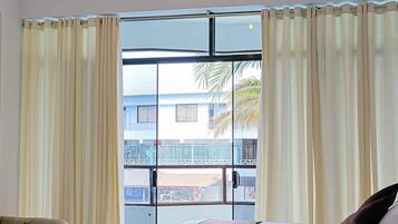 Minibar, desk, laptop workspace, iron/ironing board