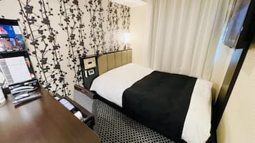 Desk, blackout drapes, free WiFi, bed sheets