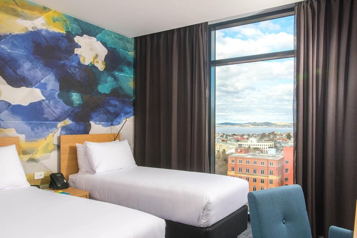 Deluxe Room, 2 Twin Beds | In-room safe, desk, blackout drapes, iron/ironing board