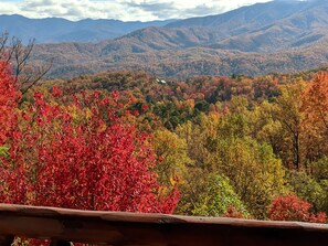 A mountainous landscape with autumn foliage.