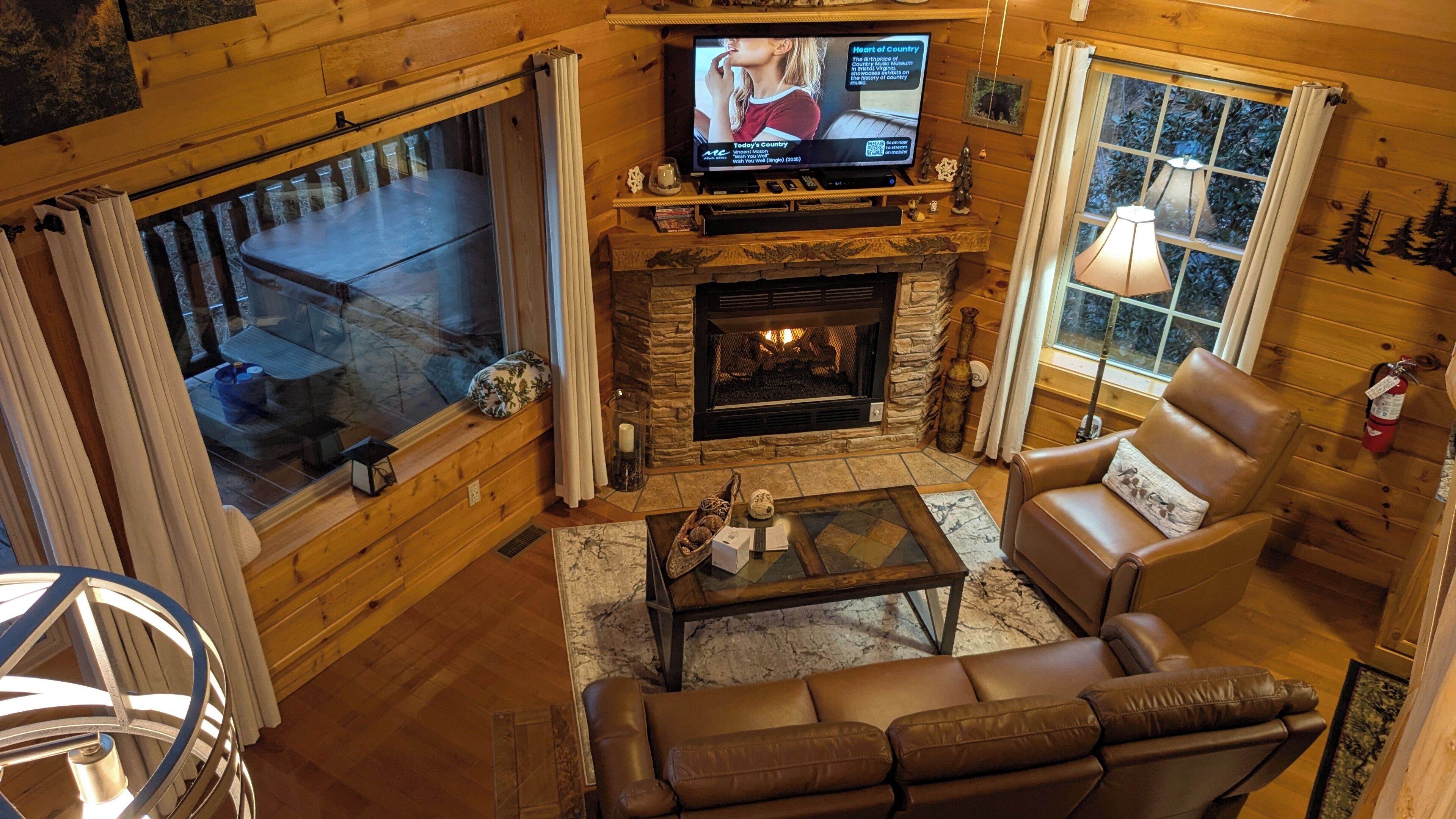 Smart TV, fireplace, DVD player, smart speakers