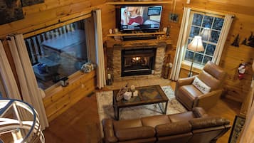 Smart TV, fireplace, DVD player, smart speakers