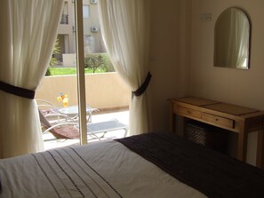 1 bedroom, desk, iron/ironing board, travel crib