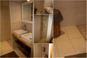 Regadera, secadora de cabello, toallas, papel de baño 