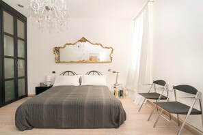 2 habitaciones, tabla de planchar con plancha, wifi y ropa de cama 