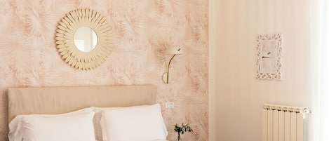 2 chambres, coffres-forts dans les chambres, fer et planche à repasser