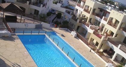 2 bedroom top floor apartment, stunning views, Aircon, 2 pools, Free WIFI