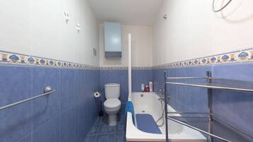 Combined shower/tub, hair dryer, towels, soap