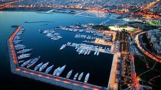 An aerial view of a marina with multiple docks and boats. - ARTISTIC VILLA  LUXURY-with lift, 8-12 people,  Acropolis view, 650m to beach (Palaio Faliro)