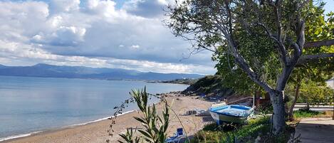 On the beach, sun-loungers, beach towels