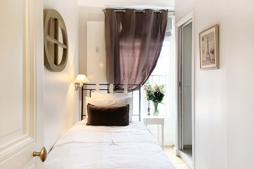 販売！ エレガントな3ベッド、壮大なエッフェルビュー、完璧なレフトバンクラグジュアリー