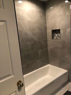 Combined shower/tub, hair dryer, towels, soap