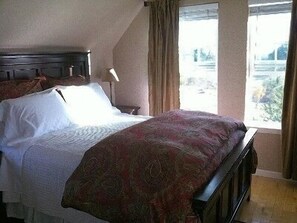 Bedroom looking out over garden and pasture