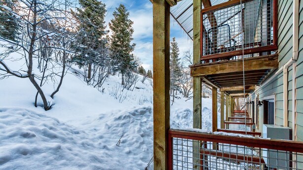 A snow-covered outdoor area with wooden structures and a metal fence. - Ski-in/Ski-Out, Walk to Main St. Clean, Spacious, REMODELED,  Arts Festvl. A/C (Park City)