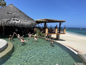 On the beach, sun loungers, beach towels