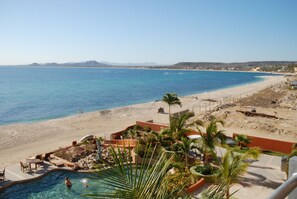 On the beach, sun-loungers, beach towels