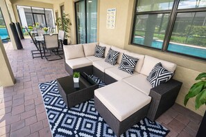 Outdoor dining - ChampionsGate, 9 Bed Luxury Spacious Villa, Sleeps 30+2, West Facing Pool & Spa (Davenport)