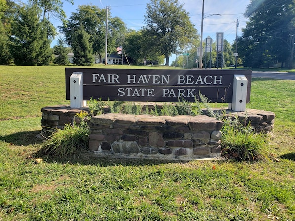 A sign for Fair Haven Beach State Park.